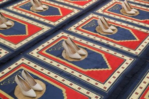 Zoulikha Bouabdellah, Silence, 2008-2014, Installation: 24 prayer rugs, 24 pair of shoes Courtesy: the artist © Zoulikha Bouabdellah